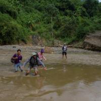 Day 1 trek - the team crossing the very very dangerous river