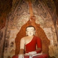 Budha and mural decoration at Kheminga