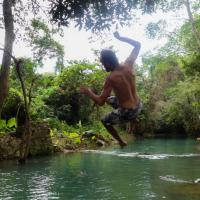 Froggy jump at Kuang Si Waterfalls