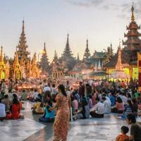 Buddhists performing rituals at Shwedagon Pagoda