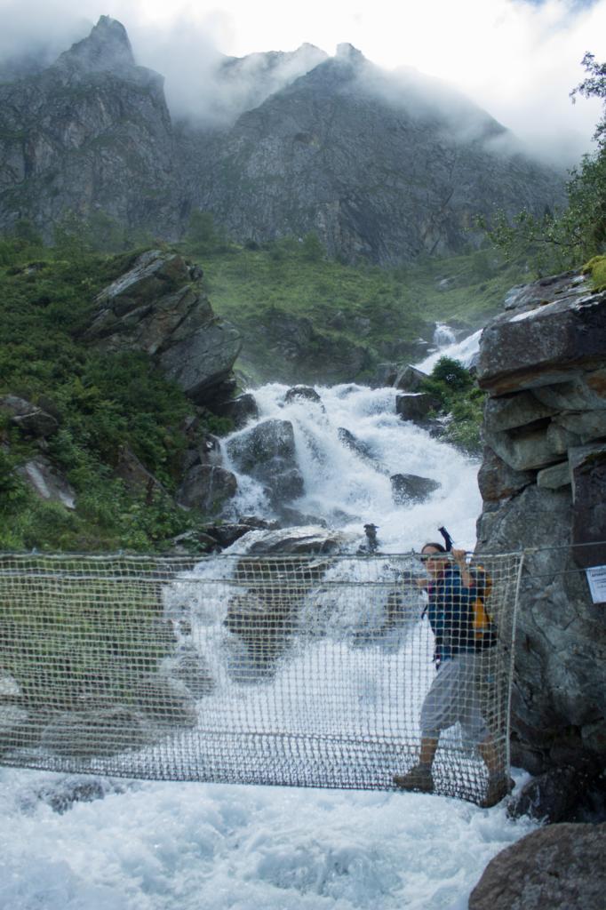 Crossing a waterfall on the way to Lac Bleu