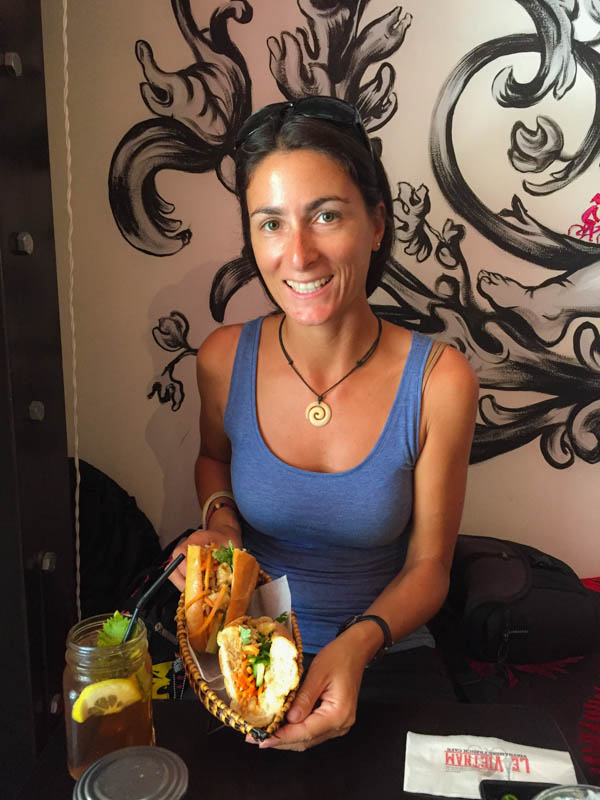 Moni enjoying her Banh Mi at Le Vietnam