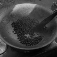 Coffee beans roasting (with a wok)