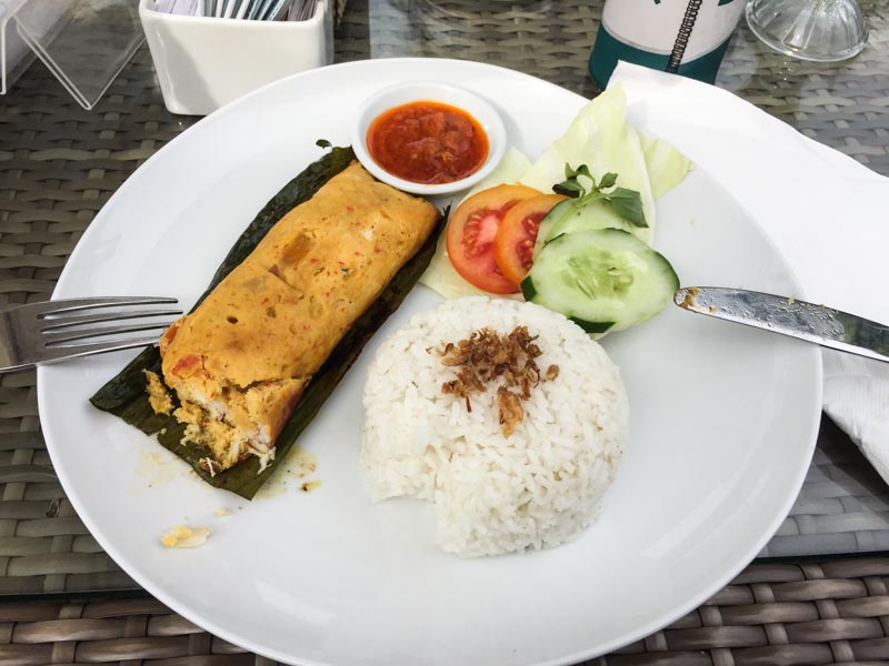 Fish cooked in banana leaves